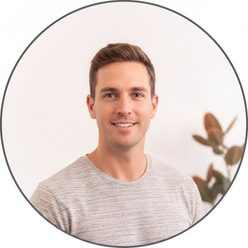 Portrait of Tom Richards, a male influencer, smiling slightly against a clean white background.